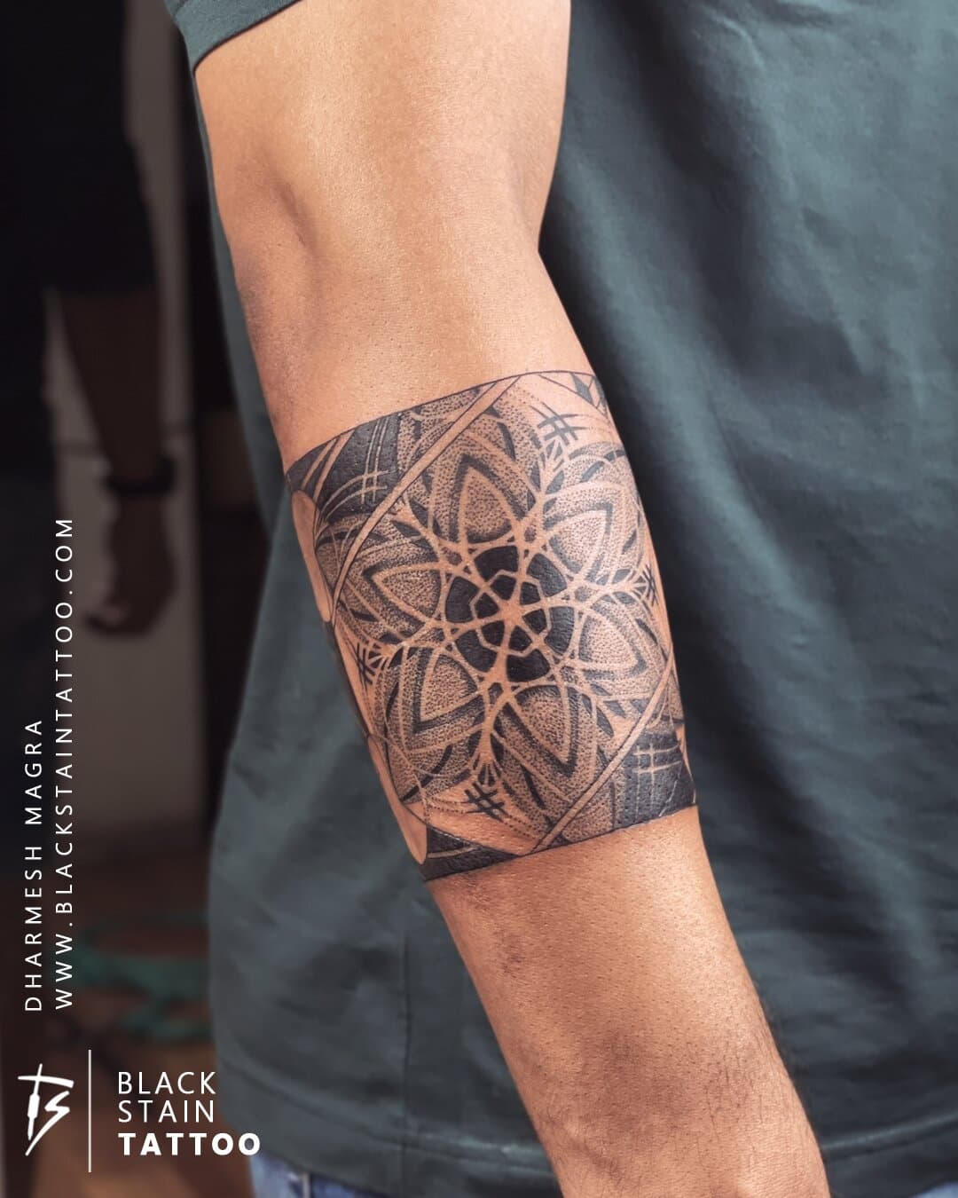 Geometric mandala armband tattoo - intricate pattern design Ahmedabad