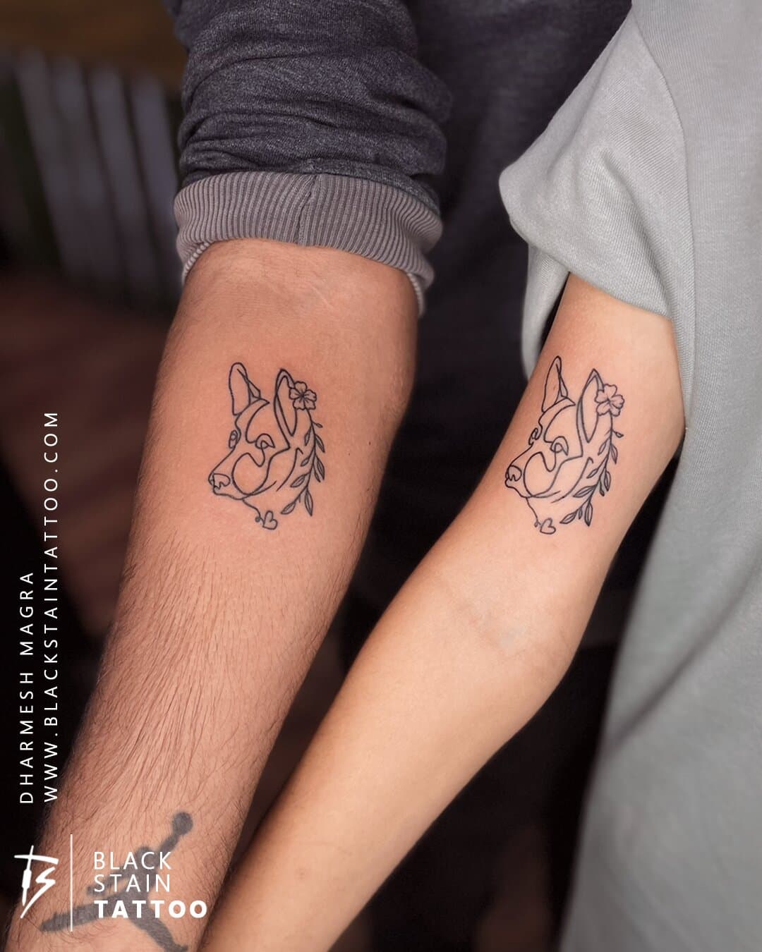 Matching couple tattoo with floral design - couples tattoo artist Ahmedabad