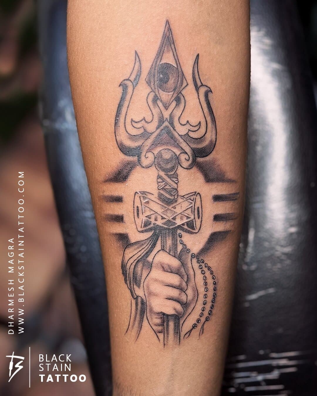 Trishul Shiva religious tattoo with spiritual symbolism - sacred tattoo Ahmedabad